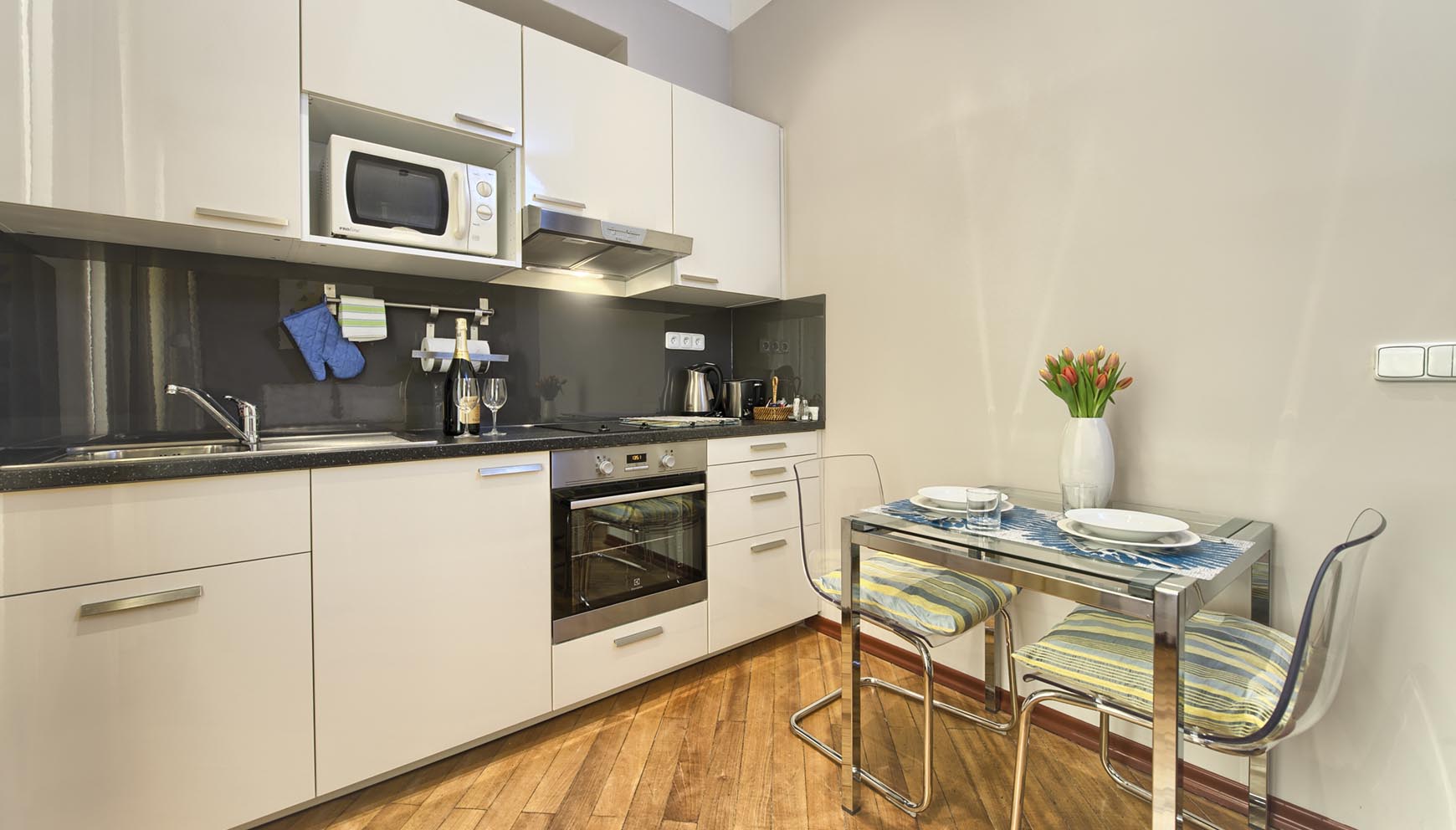 Kitchen in a studio apartment type 2 in Residence Masna